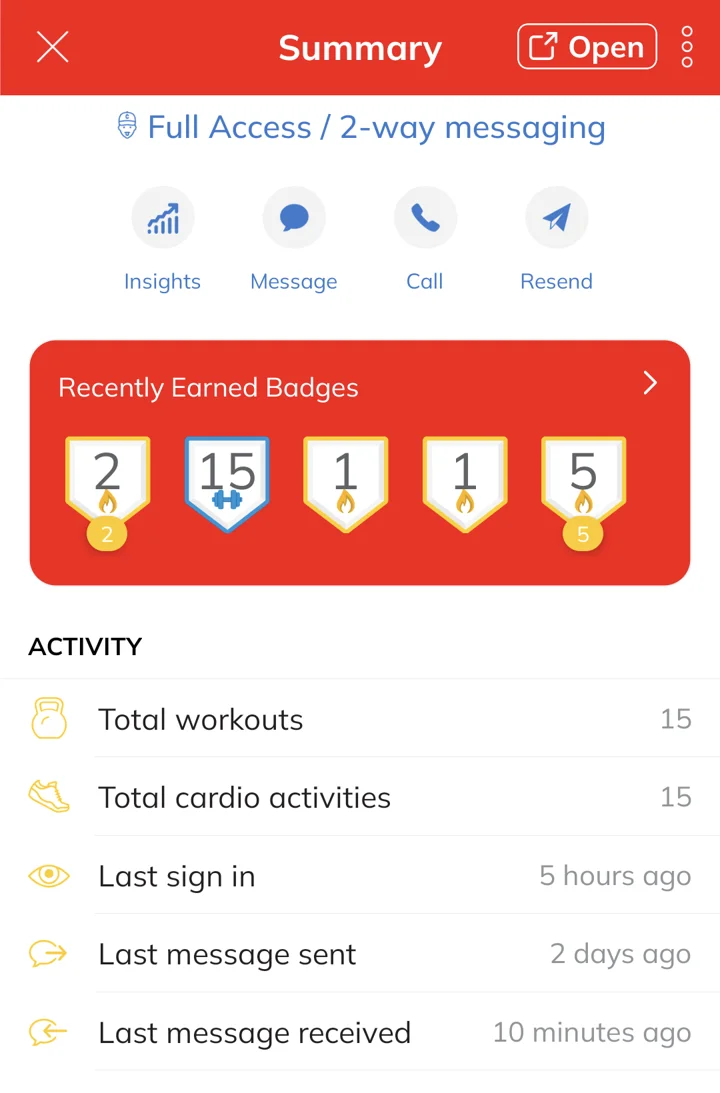 Next Level workout app showing earned badges and workout activity