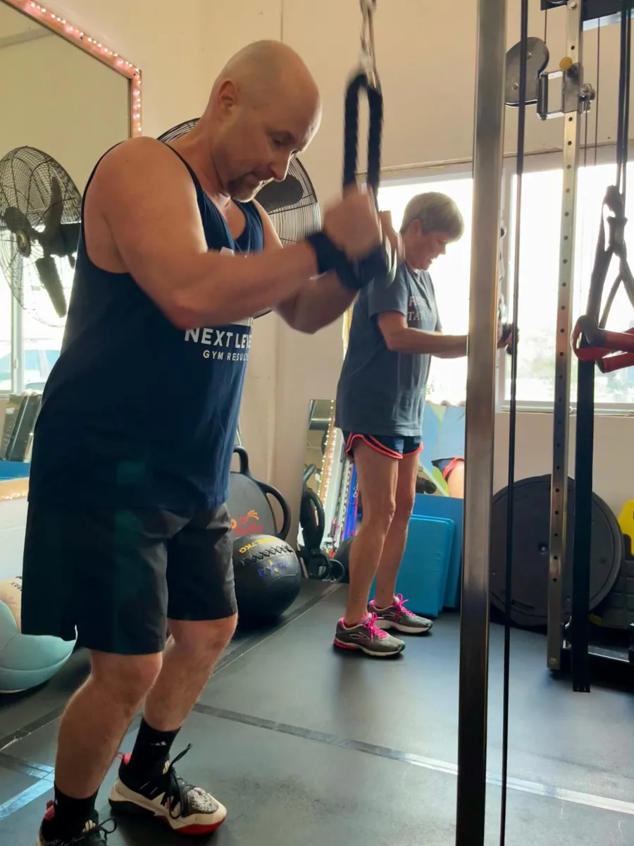 Members doing cable rows at Next Level Gym