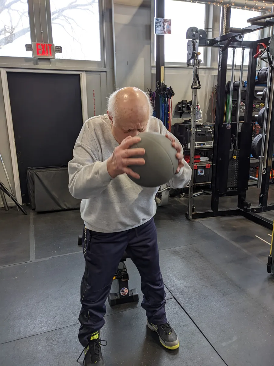 Lew training with a medicine ball
